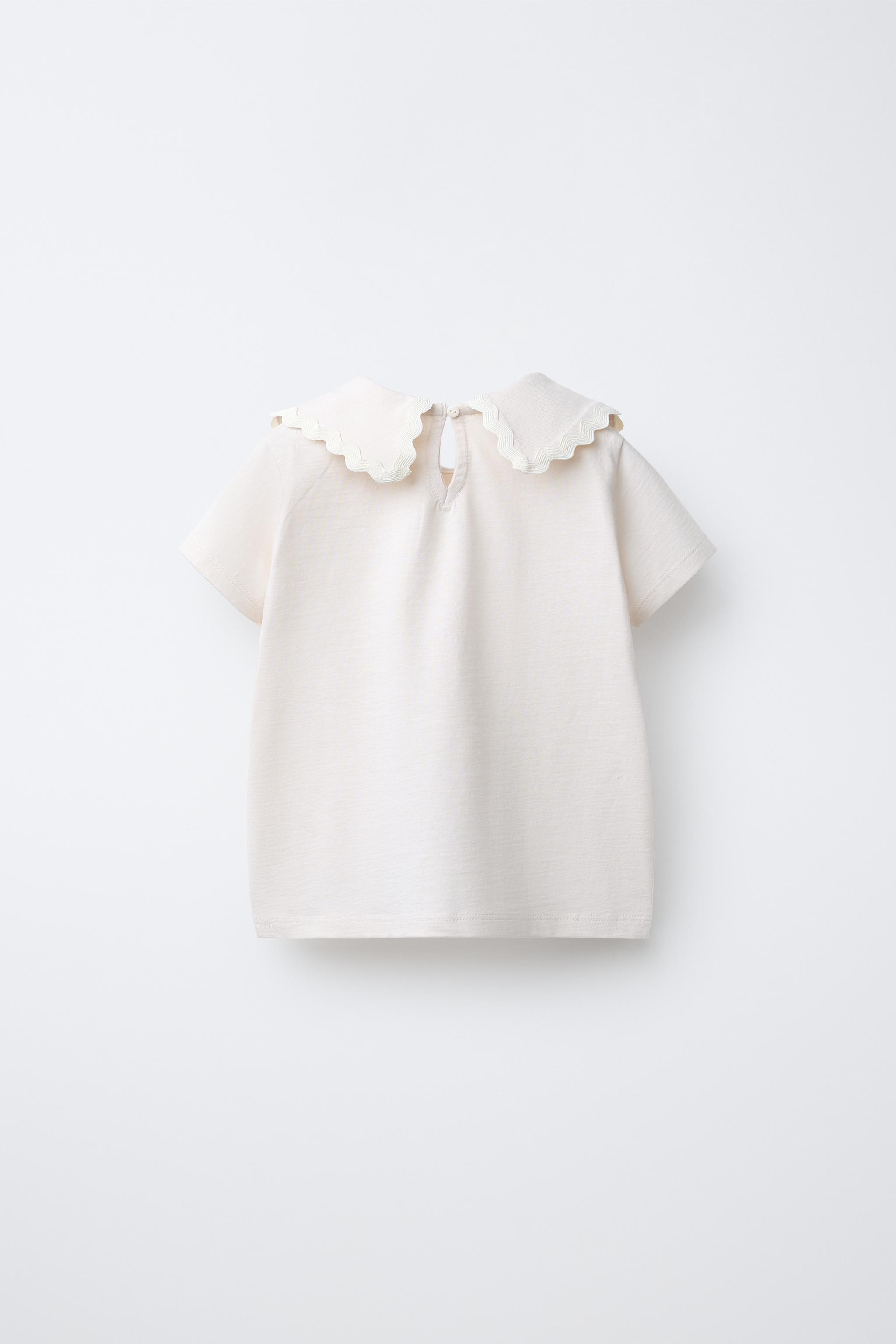 PETER PAN COLLAR TOP WITH RIPPLE TRIM